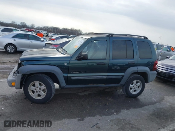 2005 Jeep Liberty Sport with VIN 1J4GL48K15W631101, listed as a IAAI auction lot 41217588 with 168,378 mi miles. Bid and sale history available at carsss.com. Image 14.