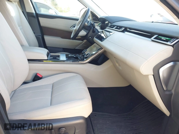 2020 Land Rover Range Rover Velar S z VIN SALYB2EXXLA295307, wystawiony jako IAAI lot #41971330 z przebiegiem 12 192 mil mil oraz . Historia ofert i sprzedaży dostępna na DreamBid. Obrazek 5.