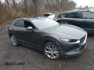 2021 Mazda CX-30 Select with VIN 3MVDMBBL2MM312752, listed as a IAAI auction lot 41933342 with 52,213 mi miles and . Bid and sale history available at DreamBid. Image 13.