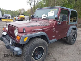 2001 Jeep Wrangler Sport with VIN 1J4FA49S31P301237, listed as a IAAI auction lot 42191884 with 154,627 mi miles and . Bid and sale history available at carsss.com. Image 2.