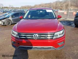 2018 Volkswagen Tiguan S with VIN 3VV1B7AX2JM050594, listed as a IAAI auction lot 41681117 with 134,654 mi miles. Bid and sale history available at carsss.com. Image 12.