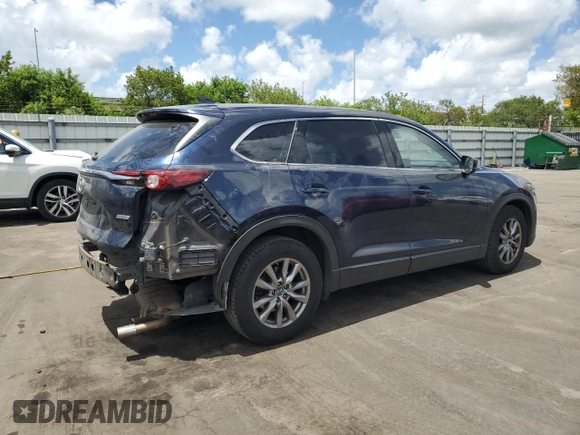 2018 Mazda CX-9 Touring with VIN JM3TCBCY3J0235048, listed as a Copart auction lot 61043915 with 82,869 mi miles and Salvage title. Bid and sale history available at DreamBid. Image 3.
