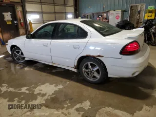 2003 Pontiac Grand Am SE1 with VIN 1G2NF52F93C143278, listed as a Copart auction lot 87167634 with 148,112 mi miles and Salvage Title. Bid and sale history available at carsss.com. Image 2.