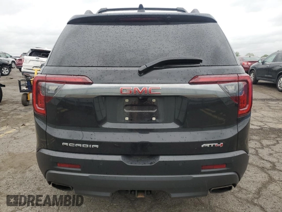 2021 GMC Acadia AT4 with VIN 1GKKNLLS5MZ168635, listed as a Copart auction lot 55988445 with 106,777 mi miles and Salvage title. Bid and sale history available at DreamBid. Image 6.