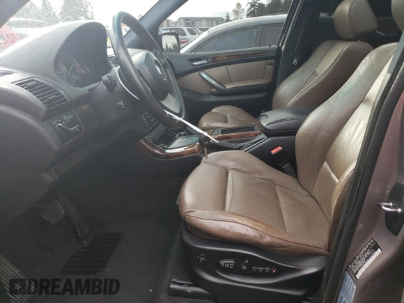 2006 BMW X5 4.4i with VIN 5UXFB53516LV27950, listed as a Copart auction lot 77837014 with 210,855 mi miles and Salvage Title. Bid and sale history available at carsss.com. Image 7.