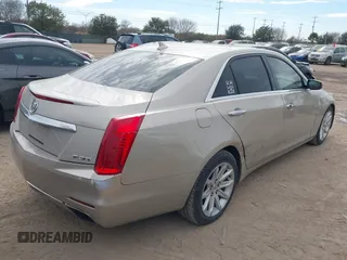 2014 Cadillac CTS Luxury RWD with VIN 1G6AR5SX6E0132580, listed as a IAAI auction lot 41349654 with 113,157 mi miles. Bid and sale history available at carsss.com. Image 4.