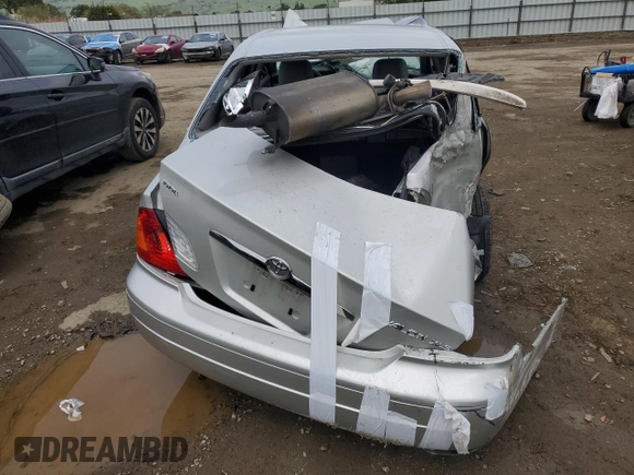 2000 Toyota Avalon XL with VIN 4T1BF28B4YU020969, listed as a Copart auction lot 51116915 with 117,924 mi miles and Salvage Title. Bid and sale history available at DreamBid. Image 6.