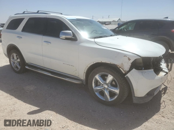 2012 Dodge Durango Citadel with VIN 1C4SDHET5CC361242, listed as a Copart auction lot 49606435 with 118,435 mi miles and Salvage title. Bid and sale history available at DreamBid. Image 4.