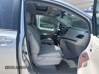 2011 Toyota Sienna XLE with VIN 5TDDK3DC3BS007297, listed as a IAAI auction lot 42158709 with 208,274 mi miles and . Bid and sale history available at DreamBid. Image 5.