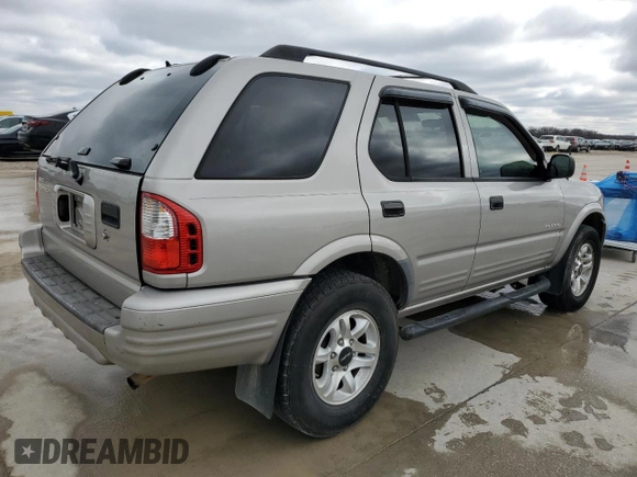 2004 Isuzu Rodeo S with VIN 4S2CK58W344311048, listed as a Copart auction lot 45154765 with 128,733 mi miles and Clean Title. Bid and sale history available at DreamBid. Image 3.