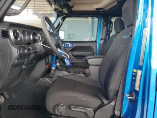 2023 Jeep Wrangler Rubicon with VIN 1C4JJXR69PW581362, listed as a Copart auction lot 58557795 with 34,357 mi miles and Salvage title. Bid and sale history available at DreamBid. Image 7.