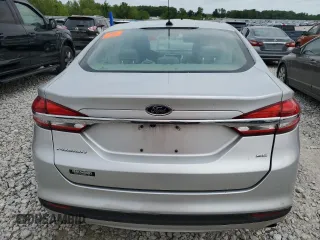 2017 Ford Fusion SE z VIN 3FA6P0H75HR279423, wystawiony jako Copart lot #58819385 z przebiegiem 115 915 mil mil oraz Czysty tytuł • Clean title. Historia ofert i sprzedaży dostępna na DreamBid. Obrazek 6.