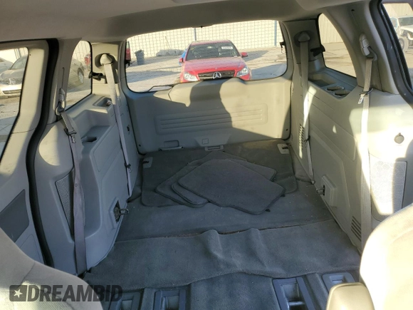 2004 Ford Freestar Cargo z VIN 2FTZA54624BA81071, wystawiony jako Copart lot #85571194 z przebiegiem 146 690 mil mil oraz Szkody całkowita. Historia ofert i sprzedaży dostępna na DreamBid. Obrazek 10.