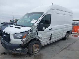 2021 Ford Transit Cargo with VIN 1FTBR1X82MKA98734, listed as a IAAI auction lot 41424123 with 84,453 mi miles and . Bid and sale history available at DreamBid. Image 6.