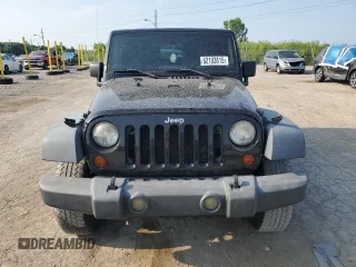 2009 Jeep Wrangler X with VIN 1J4FA24159L772540, listed as a Copart auction lot 62183815 with 179,628 mi miles and Salvage title. Bid and sale history available at DreamBid. Image 5.