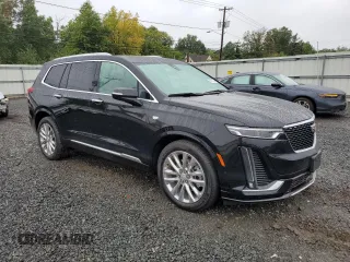 2023 Cadillac XT6 AWD Premium Luxury with VIN 1GYKPFRS0PZ100482, listed as a Copart auction lot 66685134 with 22,974 mi miles and Salvage Title. Bid and sale history available at carsss.com. Image 4.