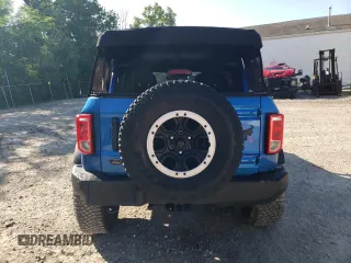 2021 Ford Bronco z VIN 1FMDE5BH2MLA73700, wystawiony jako Copart lot #63024595 z przebiegiem 63 174 mil mil oraz Szkoda całkowita • Salvage title. Historia ofert i sprzedaży dostępna na DreamBid. Obrazek 6.