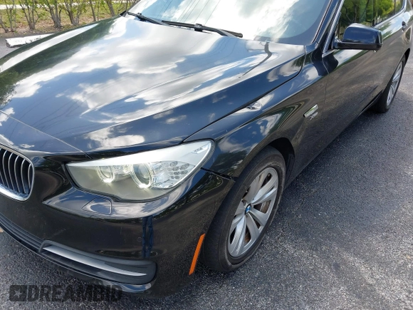 2011 BMW 5 Series GT 535i xDrive with VIN WBASP2C50BC337015, listed as a IAAI auction lot 42209500 with 136,961 mi miles. Bid and sale history available at carsss.com. Image 6.