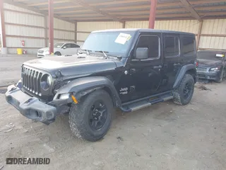 2020 Jeep Wrangler Unlimited Sport Altitude with VIN 1C4HJXDGXLW329841, listed as a IAAI auction lot 41060142 with 57,243 mi miles. Bid and sale history available at carsss.com. Image 17.