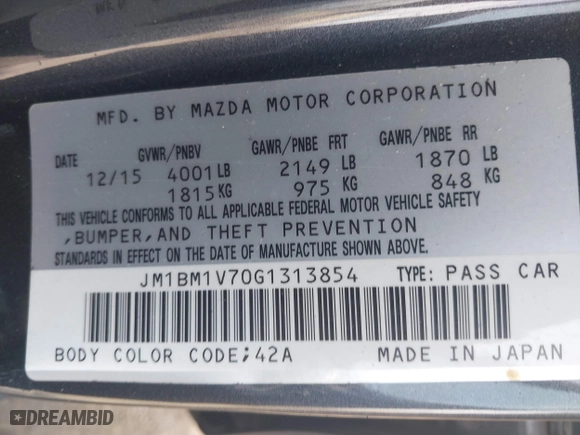 2016 Mazda Mazda3 i Touring with VIN JM1BM1V70G1313854, listed as a IAAI auction lot 41957601 with 144,128 mi miles. Bid and sale history available at carsss.com. Image 9.
