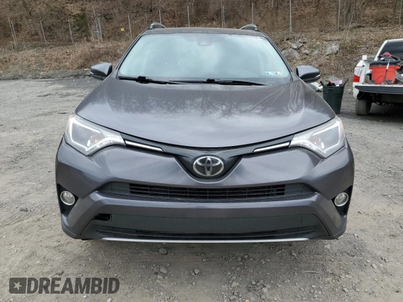 2018 Toyota RAV4 XLE with VIN JTMRFREV6JJ720655, listed as a Copart auction lot 52198195 with 178,274 mi miles and Salvage Title. Bid and sale history available at carsss.com. Image 5.
