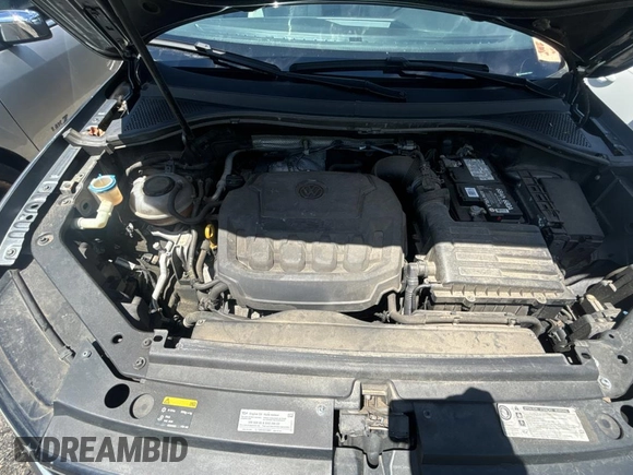 2018 Volkswagen Tiguan S z VIN 3VV0B7AX2JM014870, wystawiony jako Copart lot #65734835 z przebiegiem 118 575 mil mil oraz Czysty tytuł • Clean title. Historia ofert i sprzedaży dostępna na DreamBid. Obrazek 7.