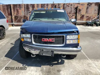 1997 GMC Suburban with VIN 1GKGK26J7VJ748464, listed as a Copart auction lot 52597135 with 176,109 mi miles and Salvage Title. Bid and sale history available at carsss.com. Image 5.