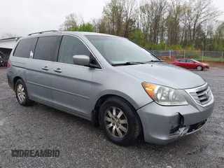 2009 Honda Odyssey EX-L with VIN 5FNRL387X9B043289, listed as a IAAI auction lot 41951208 with 197,184 mi miles and . Bid and sale history available at DreamBid. Image 6.