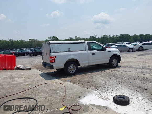 2018 Ford F-150 XL with VIN 1FTMF1CB3JKE51738, listed as a IAAI auction lot 42387561 with 110,951 mi miles and . Bid and sale history available at DreamBid. Image 4.