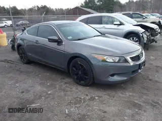 2009 Honda Accord LX-S with VIN 1HGCS12349A019583, listed as a IAAI auction lot 41146922 with 135,656 mi miles and . Bid and sale history available at DreamBid. Image 1.