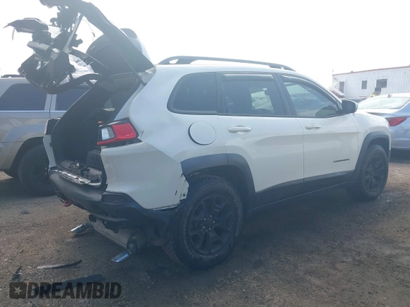 2019 Jeep Cherokee Trailhawk Elite with VIN 1C4PJMBX4KD207368, listed as a IAAI auction lot 41898251 with 49,847 mi miles. Bid and sale history available at carsss.com. Image 4.