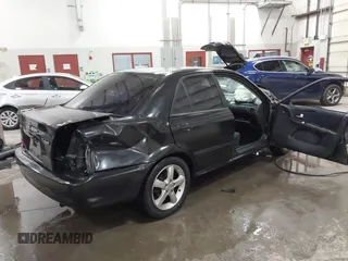 2003 Mazda Protege DX with VIN JM1BJ226431112902, listed as a IAAI auction lot 41939907 with 184,618 mi miles and . Bid and sale history available at DreamBid. Image 4.