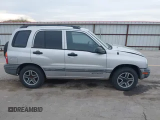 2003 Chevrolet Tracker z VIN 2CNBE134736919970, wystawiony jako IAAI lot #42203446 z przebiegiem 158 872 mil mil oraz . Historia ofert i sprzedaży dostępna na DreamBid. Obrazek 13.