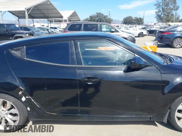 2013 Hyundai Veloster w/Black Int with VIN KMHTC6AD4DU132701, listed as a IAAI auction lot 42021759 with 102,840 mi miles and . Bid and sale history available at DreamBid. Image 13.