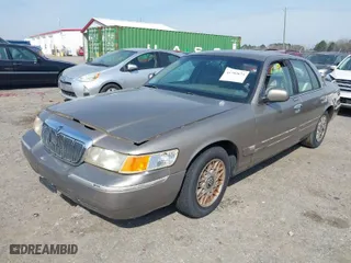 2002 Mercury Grand Marquis GS with VIN 2MEFM74WX2X659583, listed as a IAAI auction lot 41792673 with 183,449 mi miles. Bid and sale history available at carsss.com. Image 2.