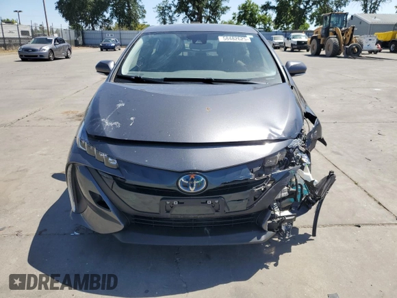 2022 Toyota Prius LE with VIN JTDKAMFP5N3200654, listed as a Copart auction lot 58482625 with 57,604 mi miles and Salvage title. Bid and sale history available at DreamBid. Image 5.
