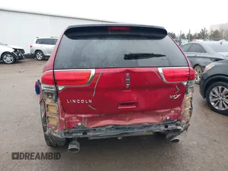 2014 Lincoln MKX with VIN 2LMDJ6JK3EBL09582, listed as a IAAI auction lot 41520611 with 157,022 mi miles. Bid and sale history available at carsss.com. Image 16.