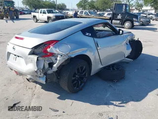 2017 Nissan 370Z with VIN JN1AZ4EHXHM951104, listed as a IAAI auction lot 41992380 with 118,356 mi miles. Bid and sale history available at carsss.com. Image 4.