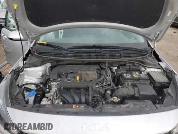2023 Kia Rio S z VIN 3KPA24AD5PE516136, wystawiony jako Copart lot #52609525 z przebiegiem 52 379 mil mil oraz Szkoda całkowita • Salvage title. Historia ofert i sprzedaży dostępna na DreamBid. Obrazek 11.
