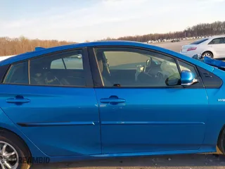 2019 Toyota Prius LE with VIN JTDL9RFU2K3013061, listed as a IAAI auction lot 41797721 with 122,721 mi miles. Bid and sale history available at carsss.com. Image 14.