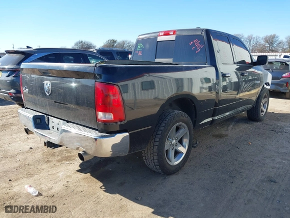 2010 Dodge Ram 1500 SLT with VIN 1D7RB1GT5AS209737, listed as a IAAI auction lot 41413982 with 185,043 mi miles. Bid and sale history available at carsss.com. Image 4.