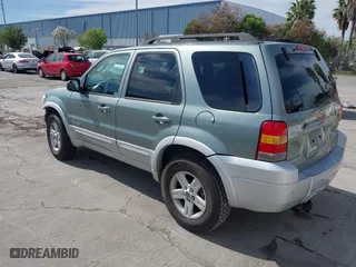 2007 Ford Escape Hybrid with VIN 1FMCU59H37KA92464, listed as a IAAI auction lot 42001479 with 159,147 mi miles. Bid and sale history available at carsss.com. Image 3.
