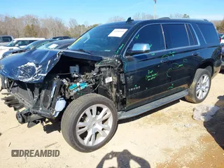 2020 Chevrolet Tahoe LTZ with VIN 1GNSCCKCXLR106732, listed as a IAAI auction lot 41486660 with Not provided miles and . Bid and sale history available at DreamBid. Image 2.