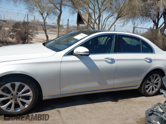 2019 Mercedes-Benz E-Class E 300 with VIN WDDZF4JBXKA597397, listed as a IAAI auction lot 41724672 with 99,258 mi miles. Bid and sale history available at carsss.com. Image 14.