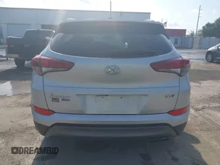 2016 Hyundai Tucson Limited with VIN KM8J33A25GU227907, listed as a IAAI auction lot 42211605 with 142,578 mi miles. Bid and sale history available at carsss.com. Image 16.