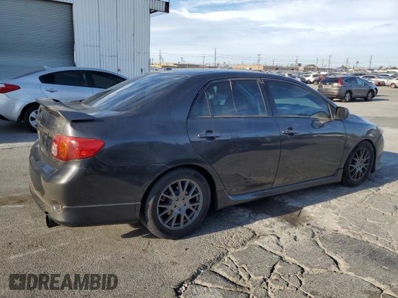 2009 Toyota Corolla XRS with VIN 1NXBE40E59Z136994, listed as a Copart auction lot 87711105 with 114,254 mi miles and Salvage Title. Bid and sale history available at carsss.com. Image 3.