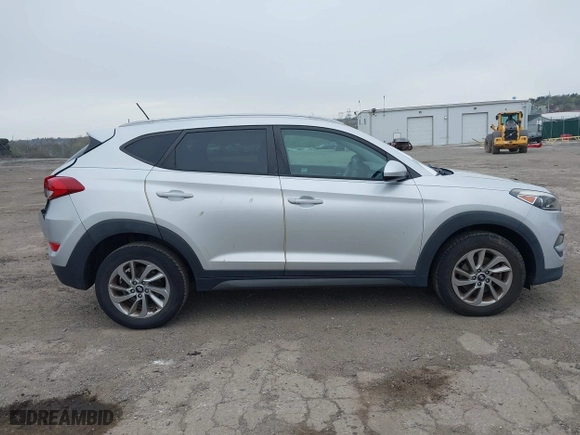 2016 Hyundai Tucson SE with VIN KM8J33A44GU187515, listed as a IAAI auction lot 42015707 with 89,948 mi miles. Bid and sale history available at carsss.com. Image 13.
