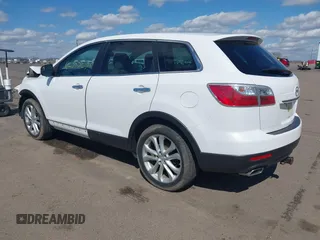2011 Mazda CX-9 Grand Touring with VIN JM3TB3DA0B0311353, listed as a IAAI auction lot 42085234 with 156,578 mi miles and . Bid and sale history available at DreamBid. Image 3.