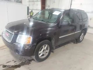 2008 GMC Envoy SLE2 with VIN 1GKDS13S682121604, listed as a IAAI auction lot 41613380 with 166,512 mi miles. Bid and sale history available at carsss.com. Image 2.