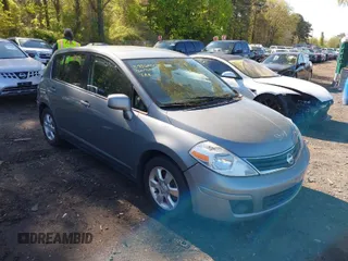 2012 Nissan Versa S with VIN 3N1BC1CP2CK804329, listed as a IAAI auction lot 39366678 with 167,539 mi miles. Bid and sale history available at carsss.com. Image 1.